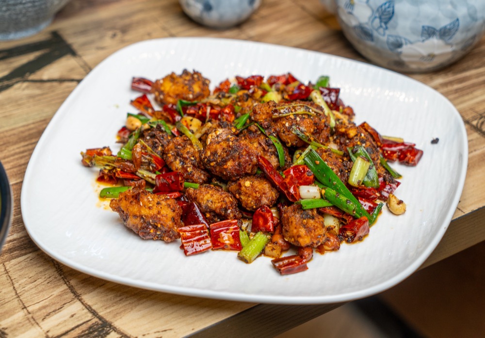 Crispy spicy chicken tossed with dried chilies and peppers